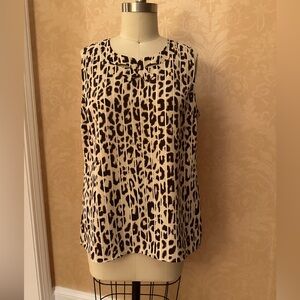 Beautiful leopard shell with stripe foreground and bow cut-out at front. Nice.